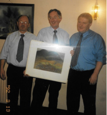 0151 : Michael Slattery (centre) on his retirement party with Martin McNamara and Pat O'Connor. Another teacher, John Considine, Clare, joined the woodwork teaching staff in 1975. For a number of years these three teachers shared Woodwork, Construction Studies, Mechanical Drawing and Technical Drawing for the Leaving Certificate.
