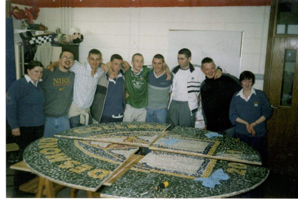0199 : The mosaic artists who now ply their trades in the rugby fields, soccer fields and GAA around the country. Their work will be preserved for generation in the school foyer. This project was dealt with in their art class which was led by Marie Tobin.